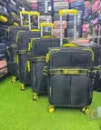 4-Piece Canvas Suitcase Set with Spinner Wheels - 1