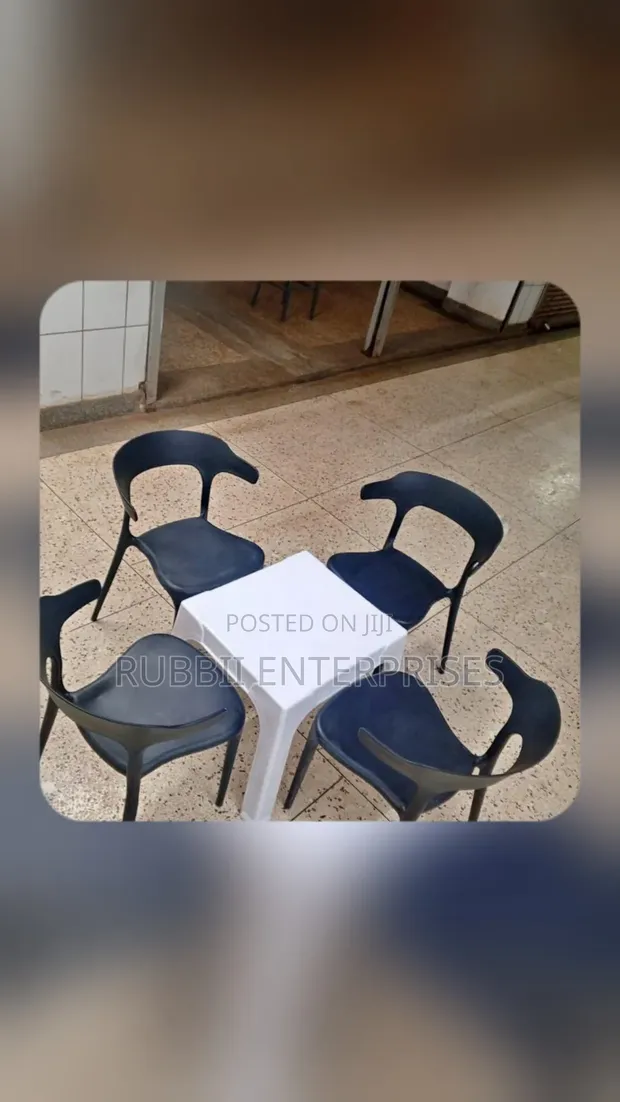 Small White Table with 4 Curved-Back Arm Chairs - 1