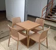 Brown Square Dining Table with 4 Armless Chairs - 1