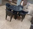 1 Round Table + 4 Molded Plastic Arm Chairs - 1