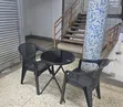 Foldable Bistro Table + Mesh-Pattern Plastic Arm Chair - 1