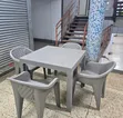 Grey Square Dining Table with 4 Molded Plastic Arm Chairs - 1