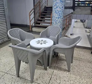 1 Round Plastic Patio Table + 4 Molded Plastic Arm Chairs