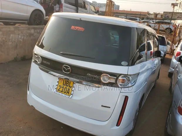 Mazda Biante 2010 White - 1