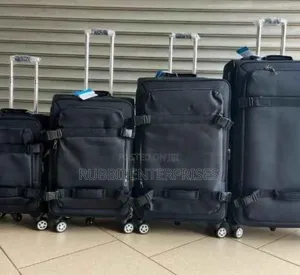 4-Piece Black Softside Rolling Upright Suitcase Set