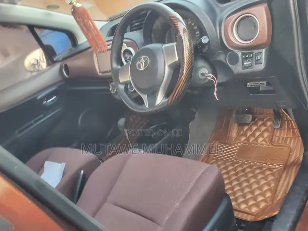 Toyota Vitz 2011 Maroon - 1