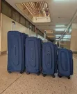 Four-Piece Navy Blue Softshell Spinner Suitcase Set - 3
