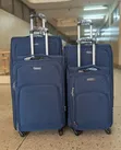 Four-Piece Navy Blue Softshell Spinner Suitcase Set - 4
