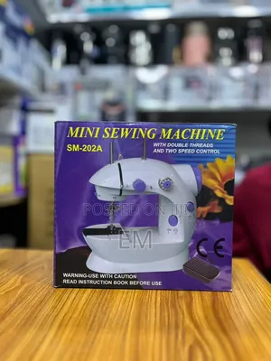Mini Sewing Machine (Model SM-202A)