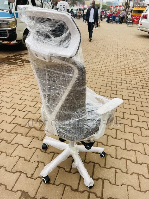 Brand New Rotating Office Chair with Headrest and Armrest - 1