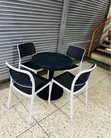 Round Table with 4 Armless Chairs (Black and White) - 1