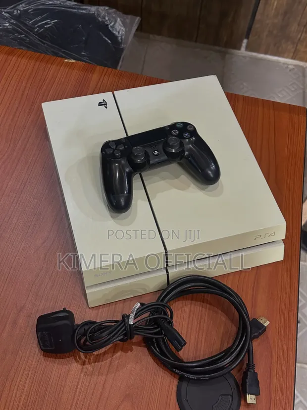 Playstation 4 Fat | Used with 12 Games and 2 Controllers - 1