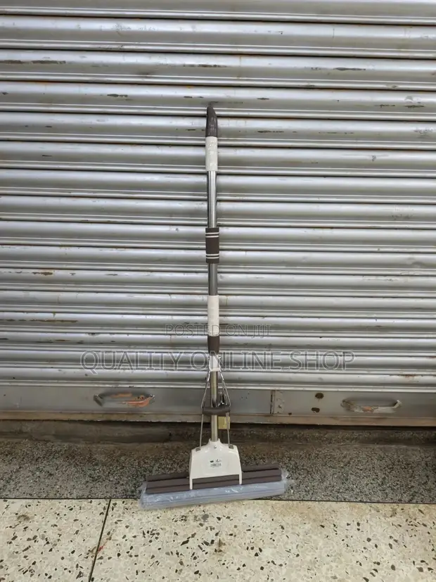 Self Squeezing Cleaning Mop - 1