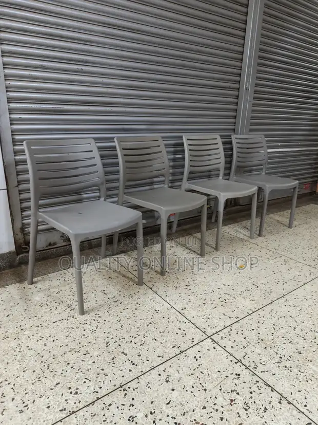 Brand New Plastic Chairs - Stackable, High Back - 1