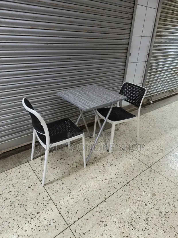 Foldable Table and 2 Plastic Chairs - 1