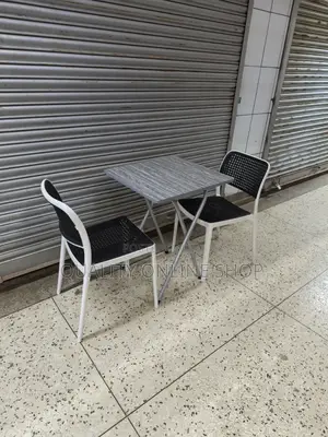 Foldable Table and 2 Plastic Chairs