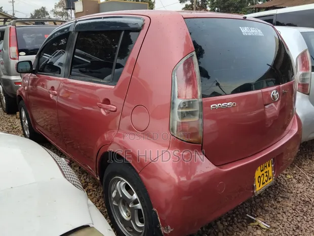 Toyota Passo 2009 Burgundy - 1