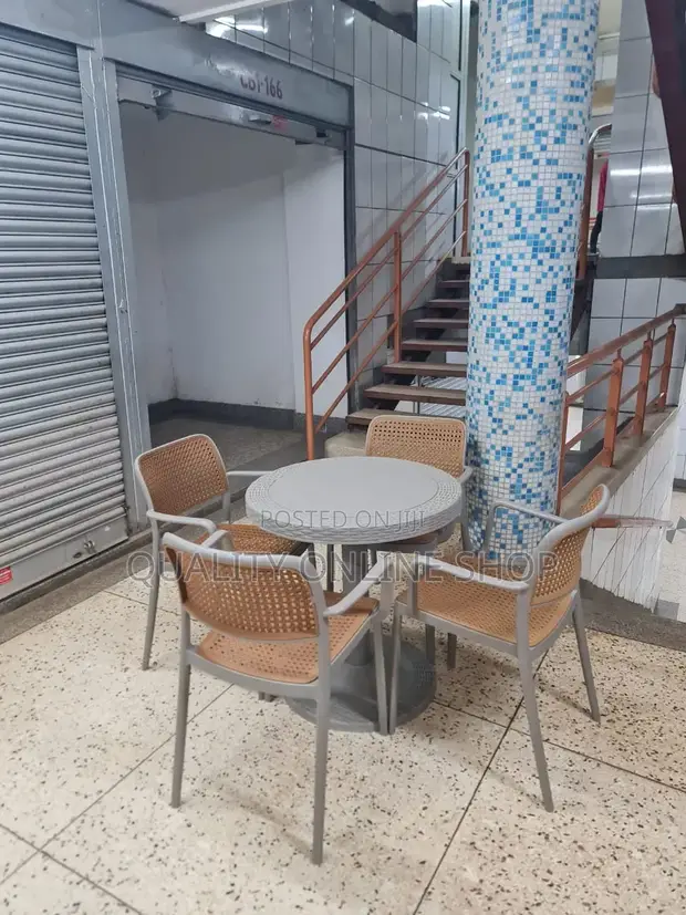 Outdoor Plastic Table and Chairs - 1