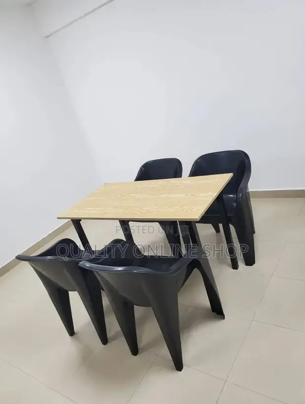Foldable Wooden Dining Table and Plastic Chairs - 1