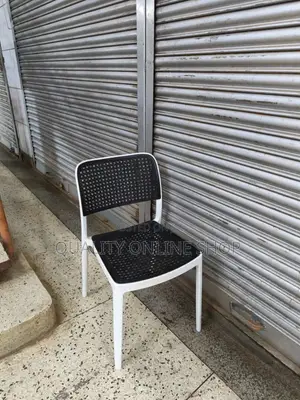 Stackable White and Black Plastic Chairs