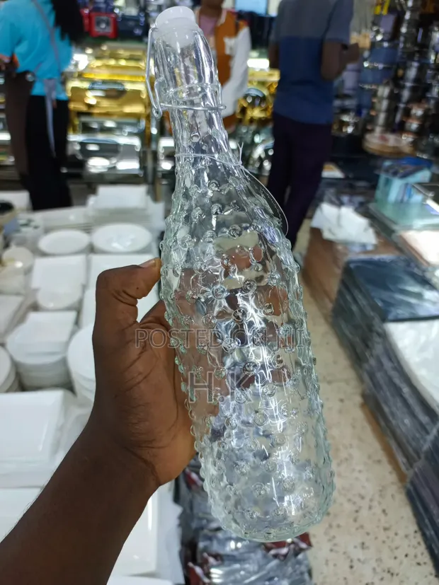 Textured Glass Beverage Bottle with Swing-Top Closure - 1
