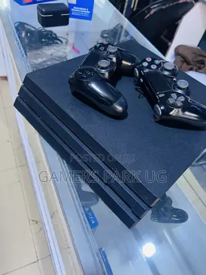 PS4 Pro Console with 20 Games, 2 Controllers & Accessories