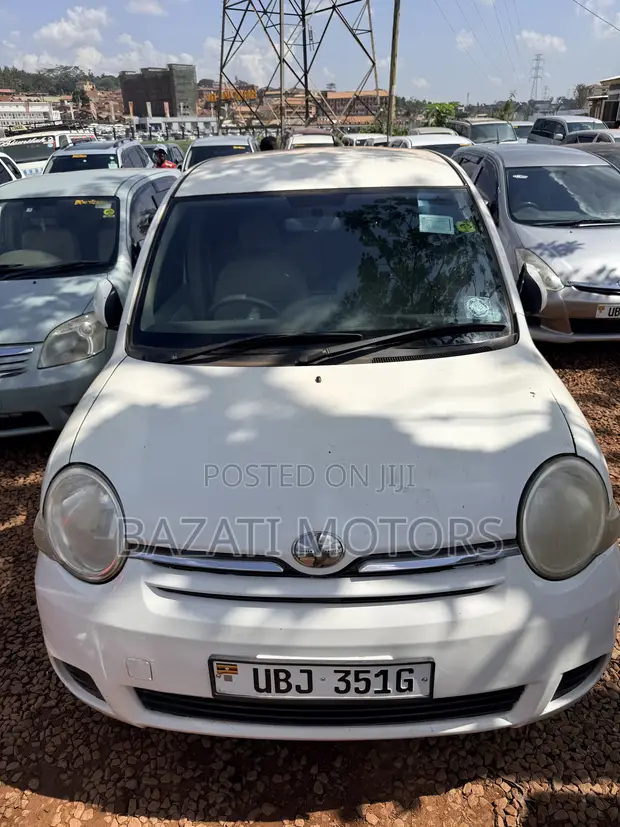 Toyota Sienta 2010 Gray - 1