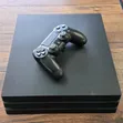Sony PS4 Pro 1TB with 32 Games and 2 Controllers - 2