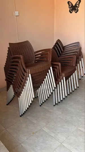 Brand New Stackable Plastic Dining Chairs with Armrests