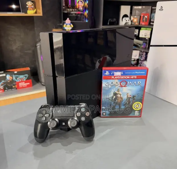 PS4 Standard Console with 1 Controller and God of War CD - 1