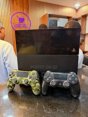 PS4 Standard Console Bundle: Chipped, 12 Games, 2 Controllers