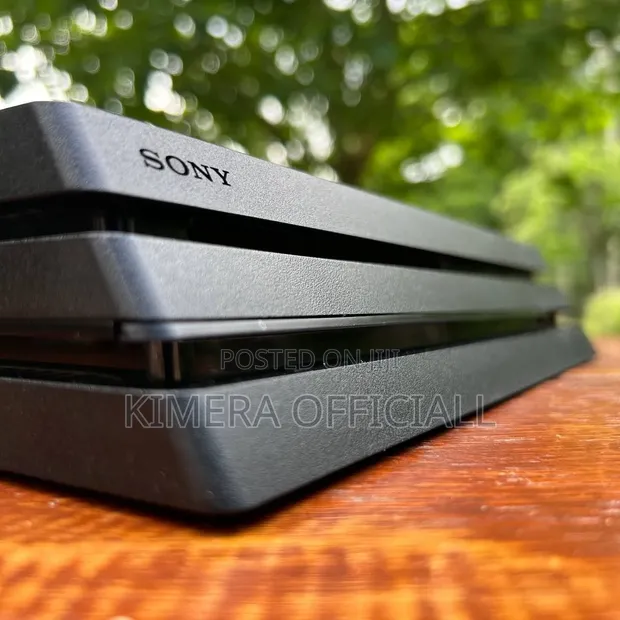 PS4 Pro Console - Chipped, 4K HDR, 30 Games - 1