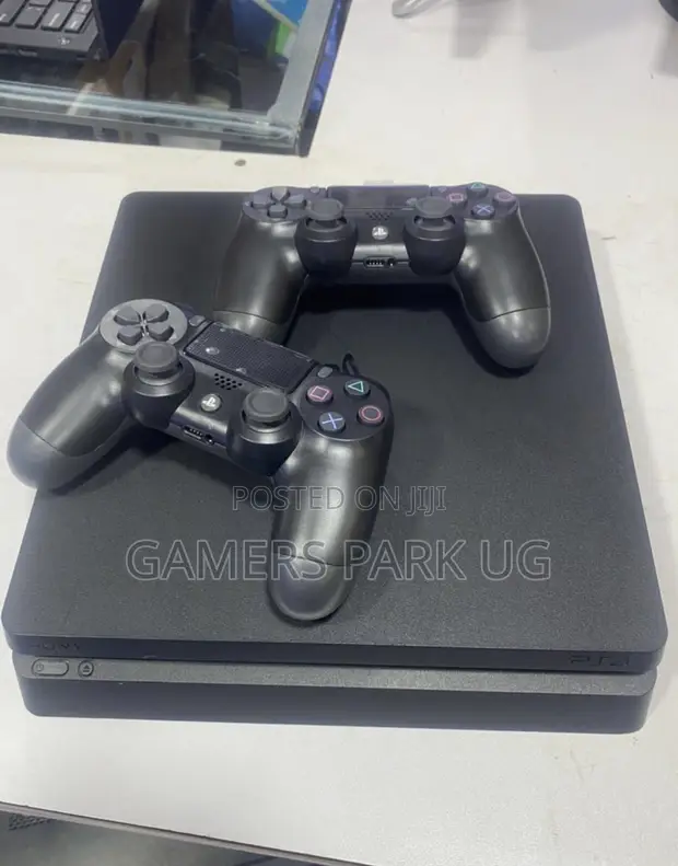 PS4 Slim Console with 2 Controllers & 8 Games - 1