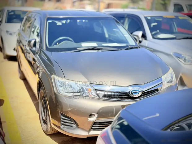 Toyota Corolla Fielder 1.5 Hybrid FWD 2014 Brown - 1