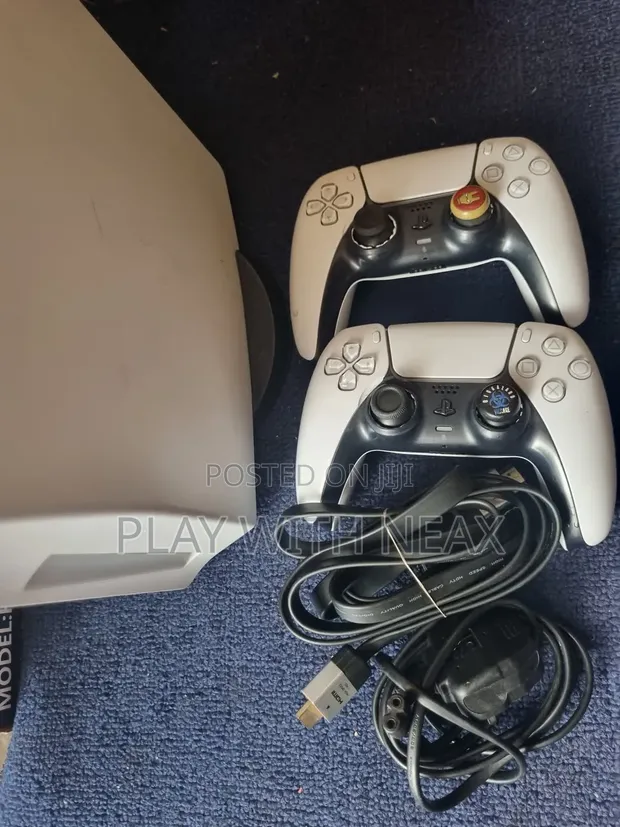 PS5 with 7 Games (Mint Condition) - 1