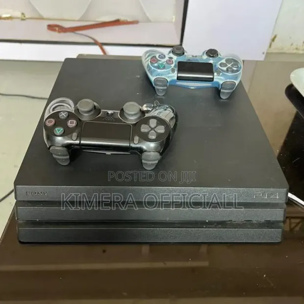 PS4 Pro 1TB Console - Chipped with 30 Games & 2 Controllers - 1