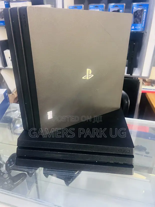 PlayStation 4 Pro - 1TB, 4K, 2 Controllers - 1
