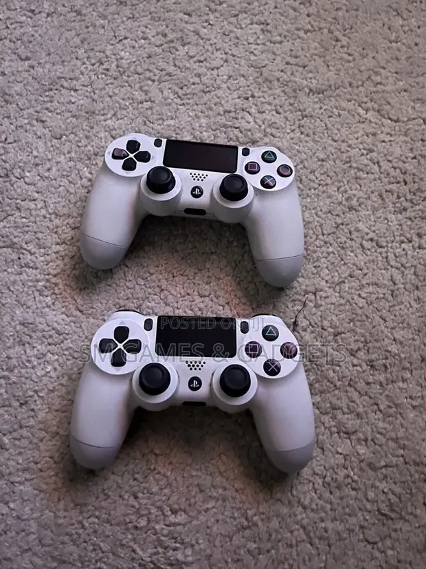 Sony PlayStation 4 Slim, 500GB, 10 Games, 2 Controllers - 1