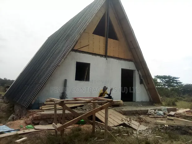A Frame Wooden House Construction - 1