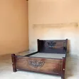 Muvule Wood Queen Bed Frame - 1