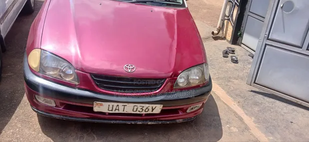Toyota Corolla II 1999 Maroon - 1