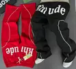 Men's Adidas Red Double Stripe Track Pants with Ankle Zippers - 2