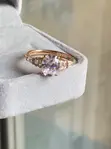 Oval-Cut Rose Gold Engagement Ring with Graduated Side Stones - 2
