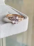 Oval-Cut Rose Gold Engagement Ring with Graduated Side Stones - 3