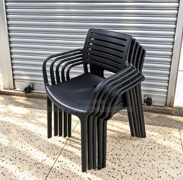 Brand New Stackable Plastic Dining Chairs with Armrests - 1