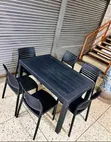 1 Black Plastic Table + 6 Black Slatted Armless Chairs - 3