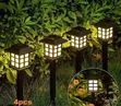 4pcs Warm White Outdoor Solar Pathway and Garden Lights - 1