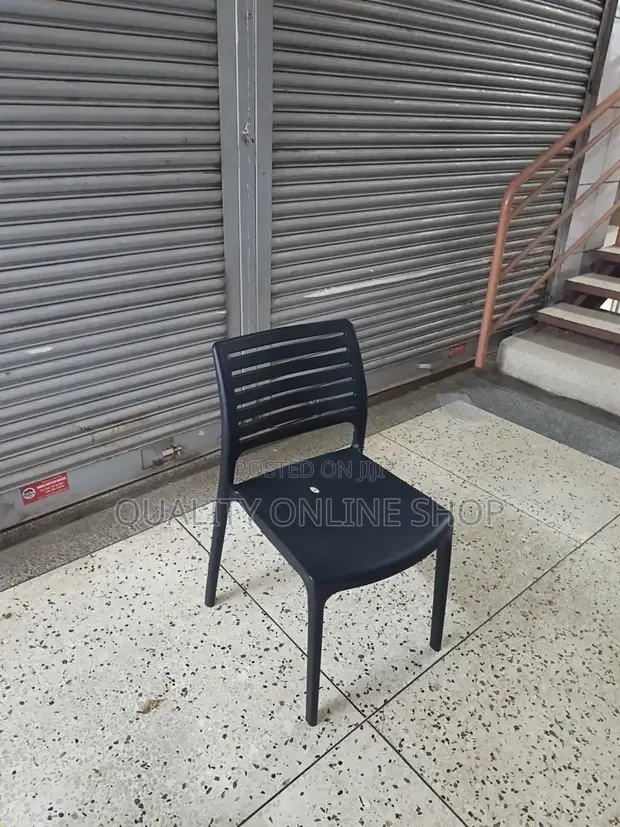 Modern Stackable Black Plastic Chairs - 1