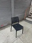 Modern Stackable Black Plastic Chairs - 1