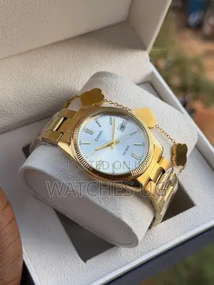 Casio Gold & White Analog Watch